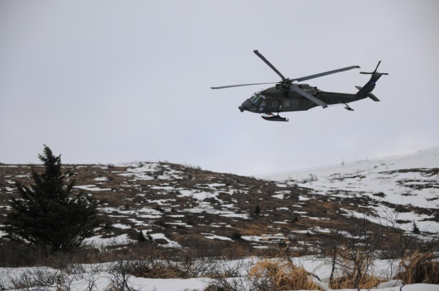 '1-Geronimo' snipers shoot from Black Hawk platform