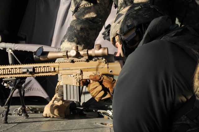 '1-Geronimo' snipers shoot from Black Hawk platform