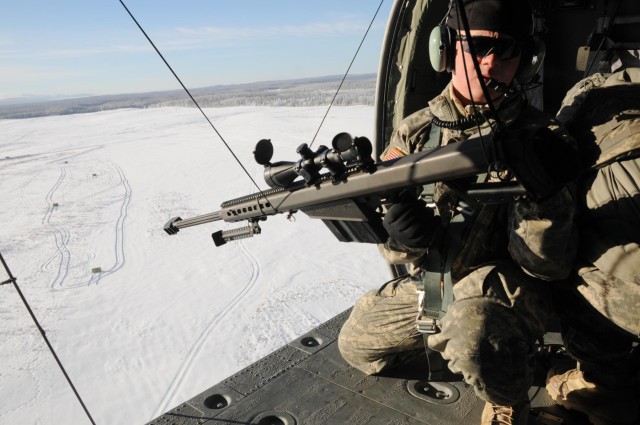 '1-Geronimo' snipers shoot from Black Hawk platform