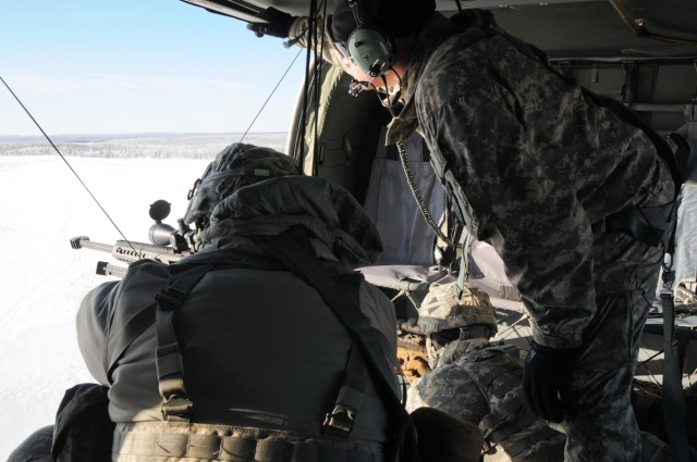 '1-Geronimo' snipers shoot from Black Hawk platform