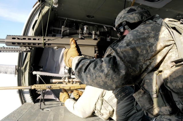 '1-Geronimo' snipers shoot from Black Hawk platform