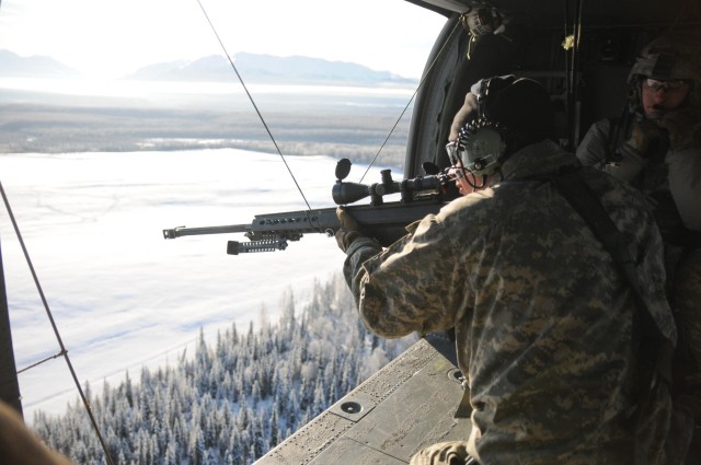 '1-Geronimo' snipers shoot from Black Hawk platform
