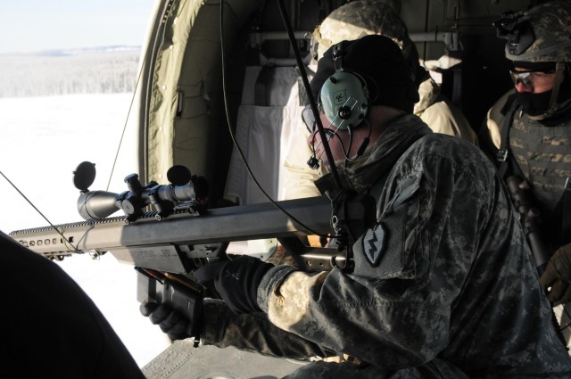 '1-Geronimo' snipers shoot from Black Hawk platform