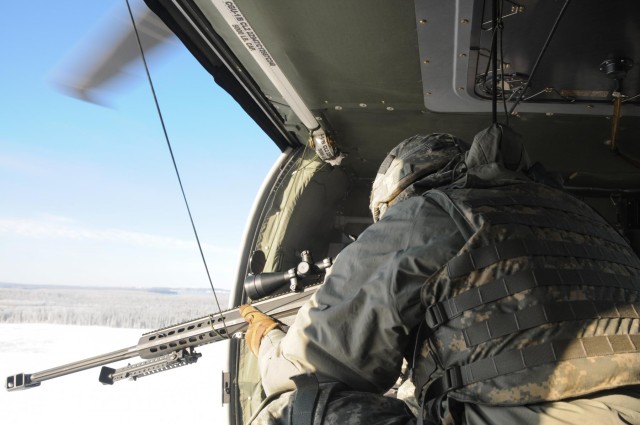 '1-Geronimo' snipers shoot from Black Hawk platform
