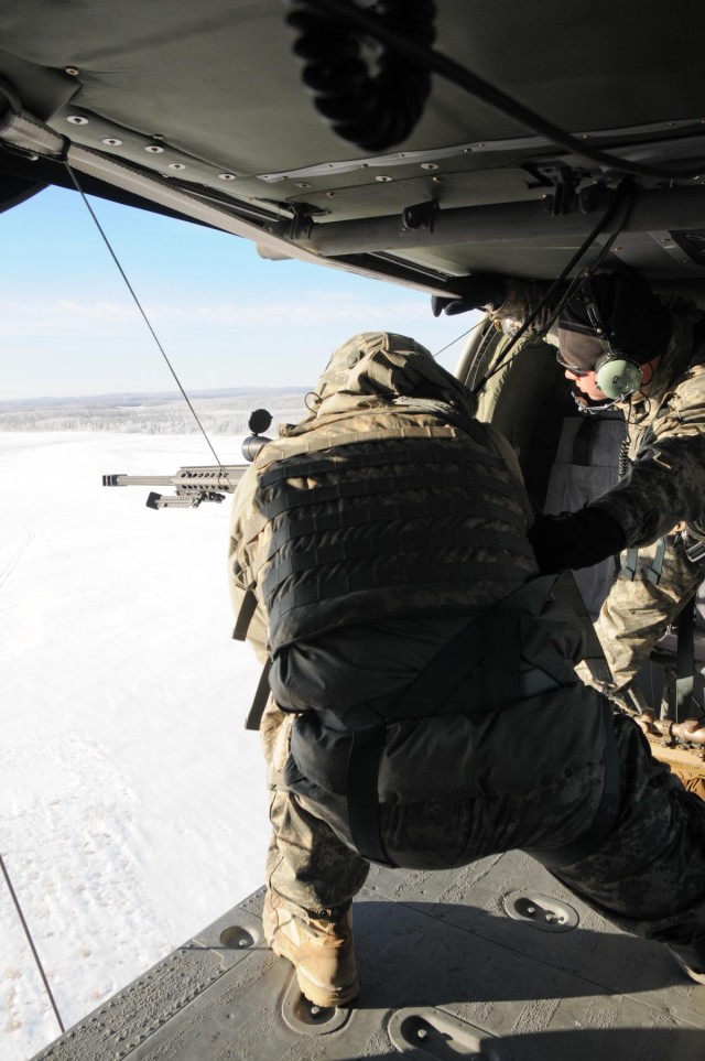 '1-Geronimo' snipers shoot from Black Hawk platform