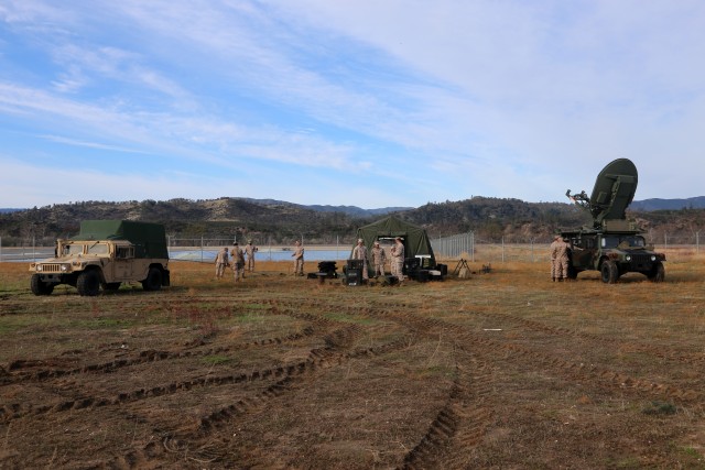 Marines set up comm systems at Fort Hunter Liggett