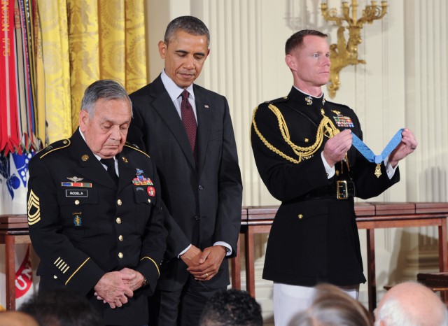 Obama Listens to Master Sgt. Jose Rodella Citation Before Awarding MOH