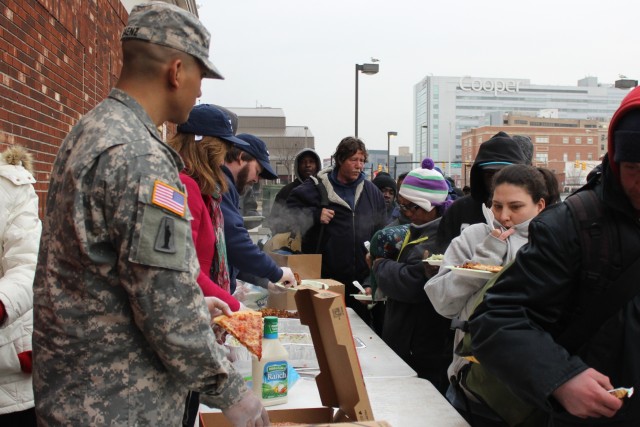 Soldier serving homeless goes viral on social media