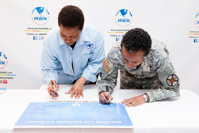 JBM-HH employees, leadership sign employee/customer covenant