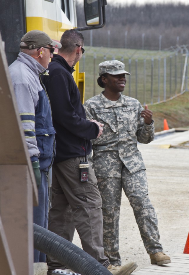 Sgt. Dafney-Pressley at the Camp Bondsteel fuel blivets