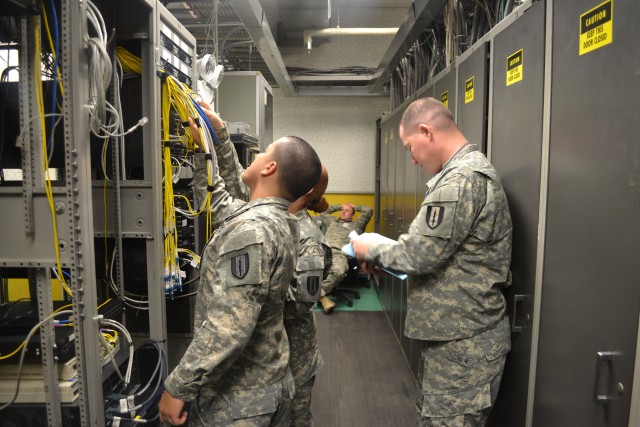 Staff Sgt. James Walker how to proficiently conduct self-diagnosis on various signal equipment