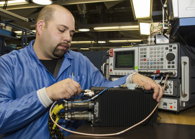 Mechanics, engineers earn Teamwork Award; improvements lead to radio repair success