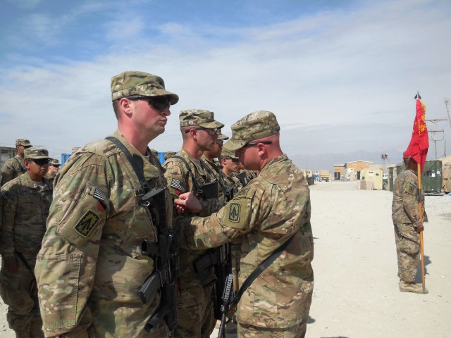 A 2-44 ADA Soldier receive their combat patch