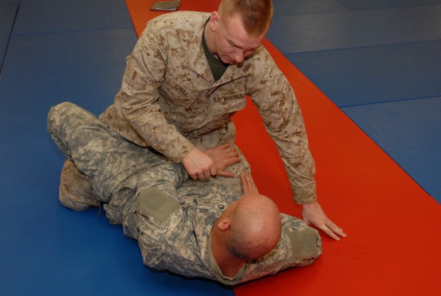 Training for Modern Army Combatives is 'purple' at Joint Base Article