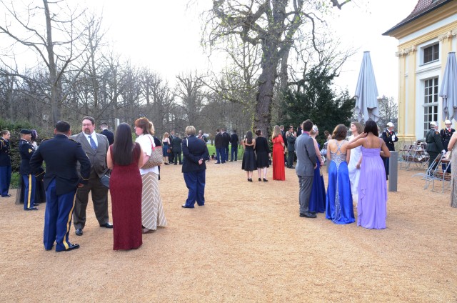Guests and attendees of the ball arrive