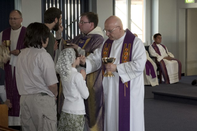 The ceremony of the Eucharist.