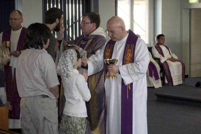 The ceremony of the Eucharist.