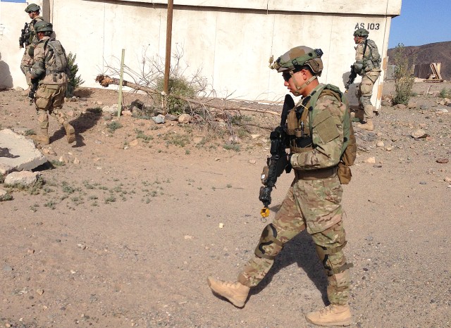 Spc. Kevin Nguyen on a training patrol at the NTC