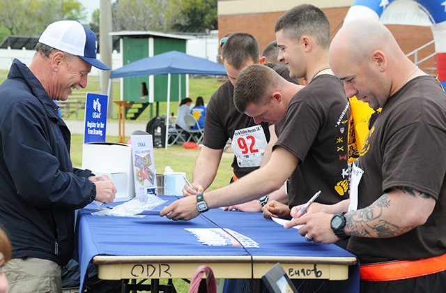 Community turns out to remember fallen heroes, support survivors