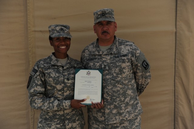 Staff Sgt. Duncan poses with her NCOIC Master Sgt. Gallegos
