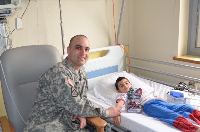 5th Signal Command first sergeant uses Army training to save local boy's life.