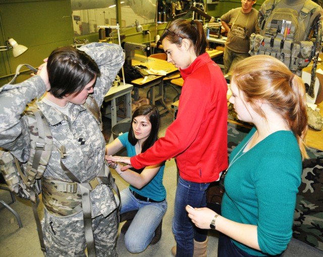 Worcester Polytechnic Institute students test fit their female-friendly rucksack hip belt design