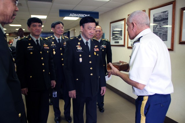Tripler and Royal Thai Army leaders conduct a gift exchange