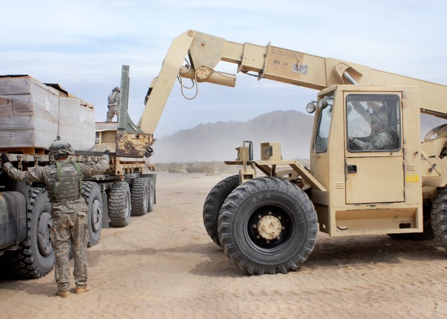Sgt. 1st Class Ronald Whistler operates forklift