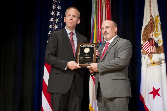 Soldier, civilian employees honored with 2014 SecArmy Awards [Image 4 of 10]