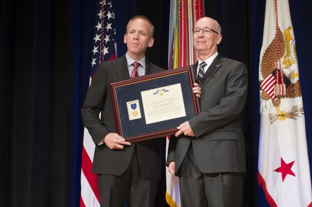 Soldier, civilian employees honored with 2014 SecArmy Awards [Image 4 of 10]