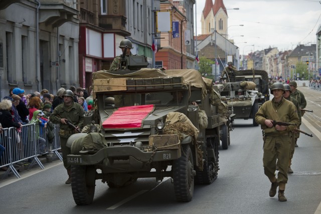 A motorcade of authentic WWII-era U.S. military vehicles are displayed during the Pilsen Liberation Festival