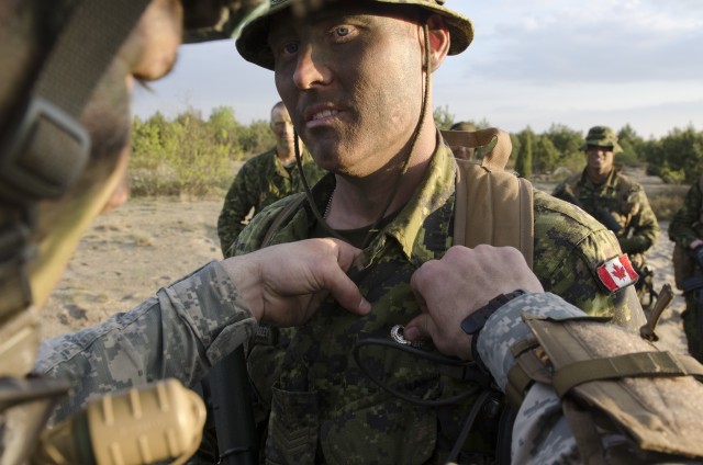 American, Canadian paratroopers jump in to Poland for exercise