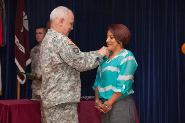 Eva Rossy receives her award