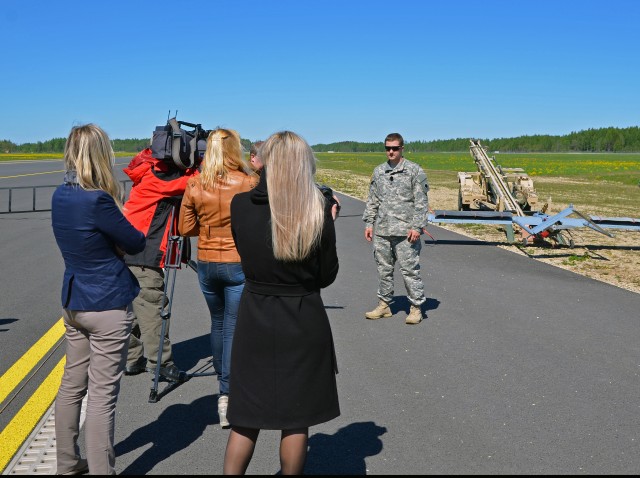 Latvian Media Interviews Michigan Soldier