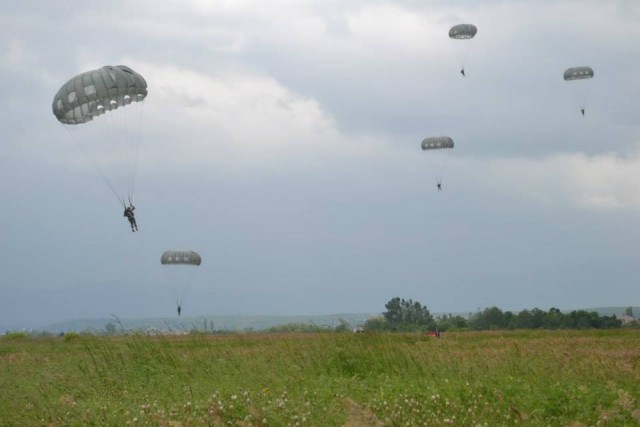 Paratroopers descend into Kosovo