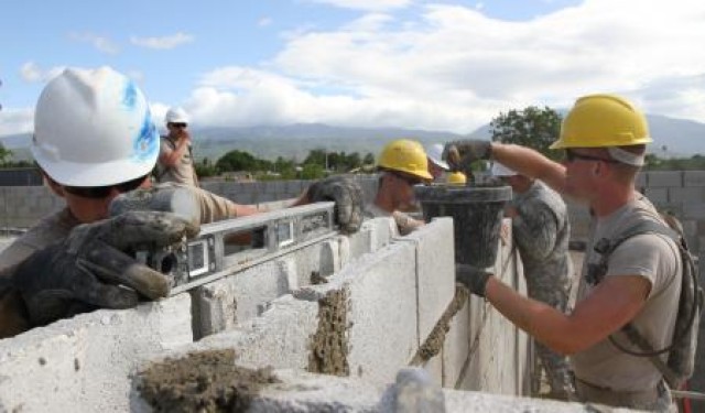 Engineers finalize base for a new school in the Dominican Republic