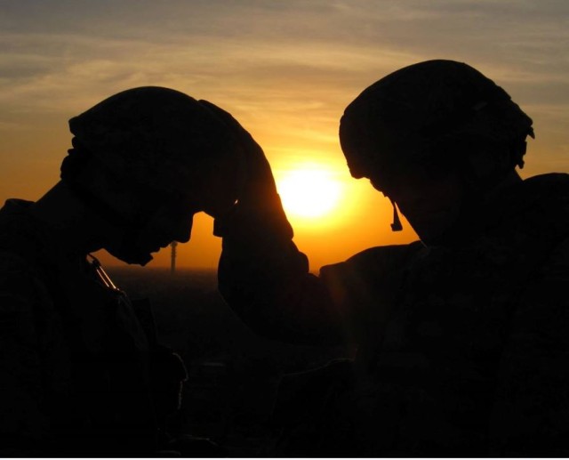 Chaplain Prayers with Soldier