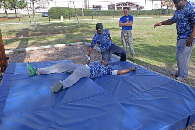'Dog Face' soldiers, Columbus Lions tackle obstacle course