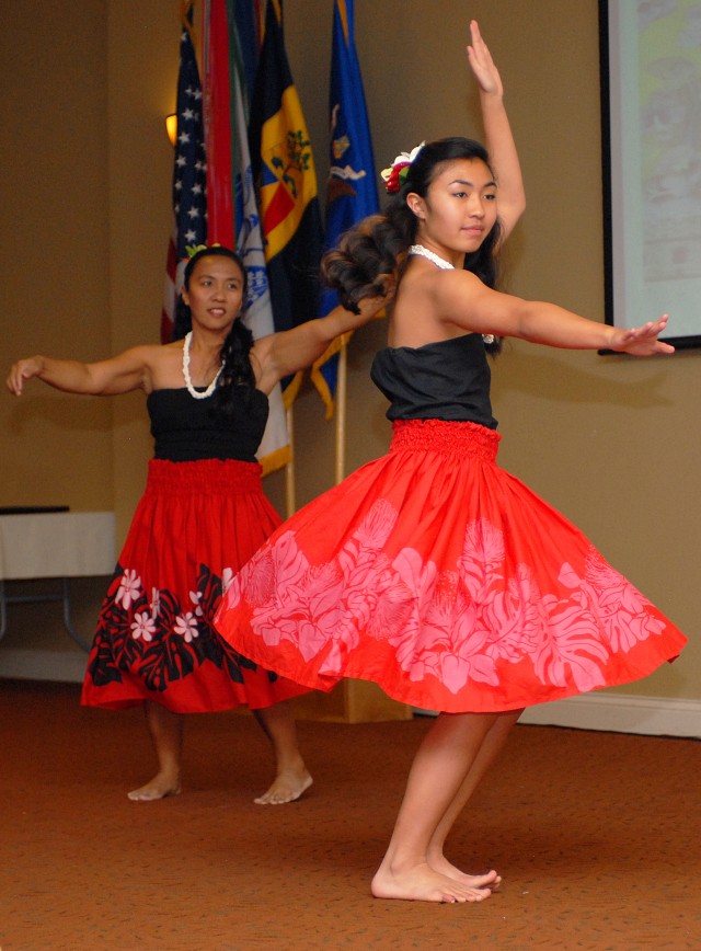 Hannah Kimura and Rhonda Kimura perform a mele dance