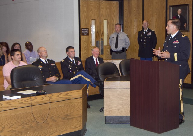 Bronze Star Medal presented to Army Reserve lawyer and judge in his civilian courtroom