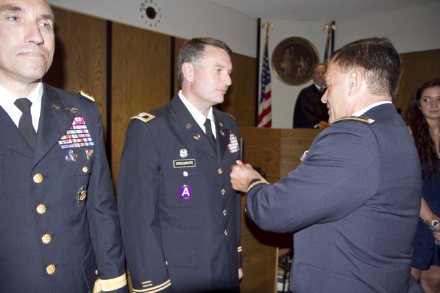 Bronze Star Medal presented to Army Reserve lawyer and judge in his civilian courtroom