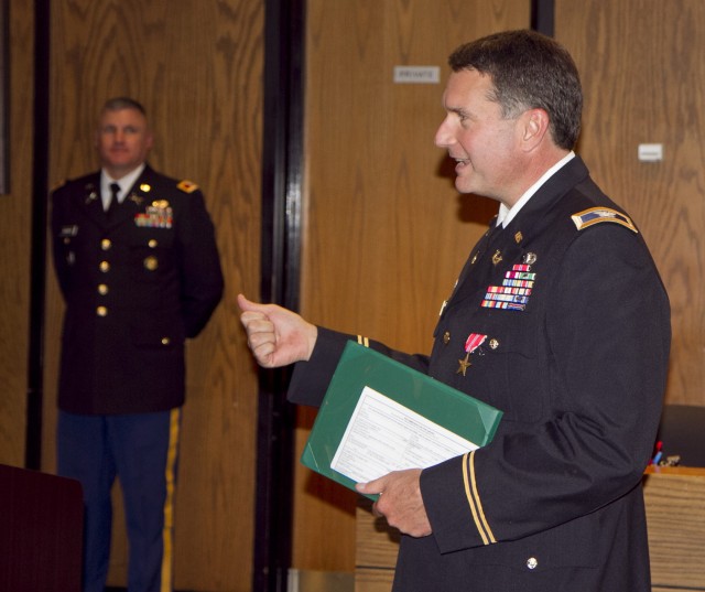 Bronze Star Medal presented to Army Reserve lawyer and judge in his civilian courtroom