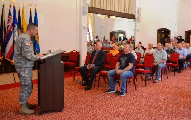 The garrison commander addresses the retirees