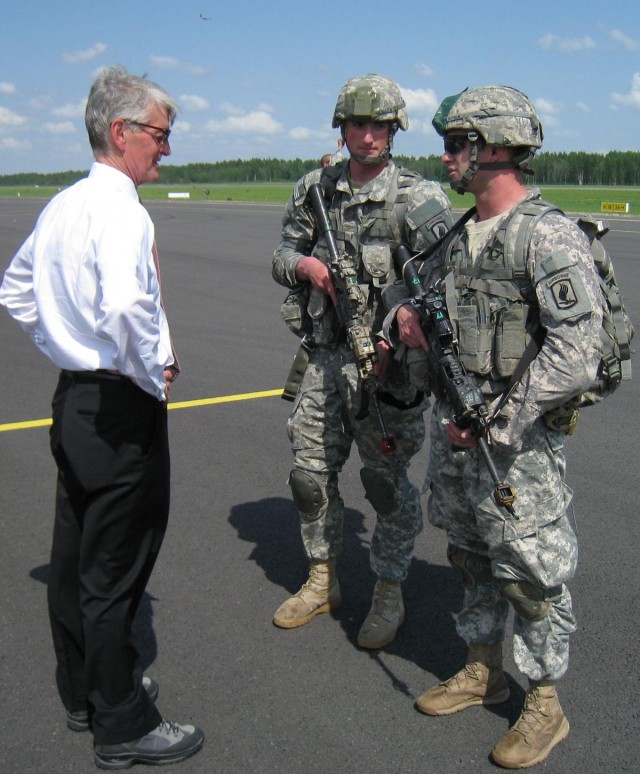 Secretary of the Army performs impromptu reenlistment in Latvia