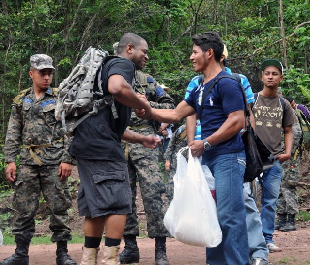 US troops carry 2,500 pounds of food, supplies to remote village in Honduras