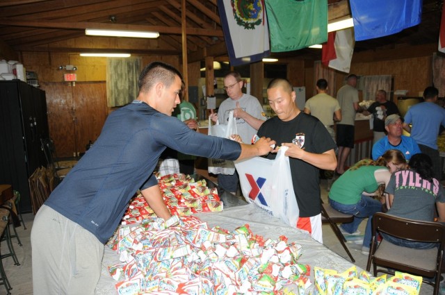 US troops carry 2,500 pounds of food, supplies to remote village in Honduras