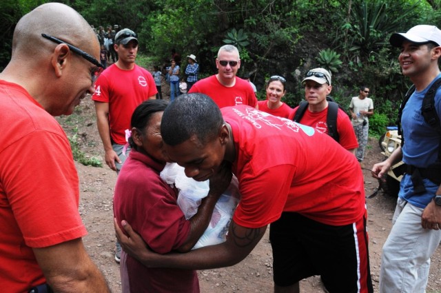 US troops carry 2,500 pounds of food, supplies to remote village in Honduras