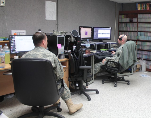 Broadcasters prepare for an upcoming radio show