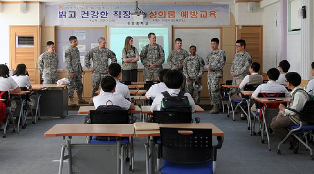 Teach Thy Neighbor: Middle School Students Learn English from Soldiers
