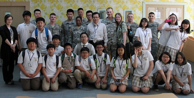 Teach Thy Neighbor: Middle School Students Learn English from Soldiers